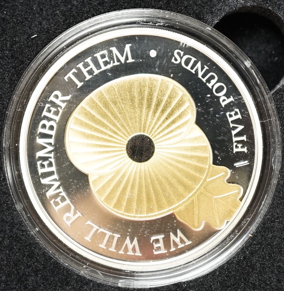 A group of assorted boxed collector's coins